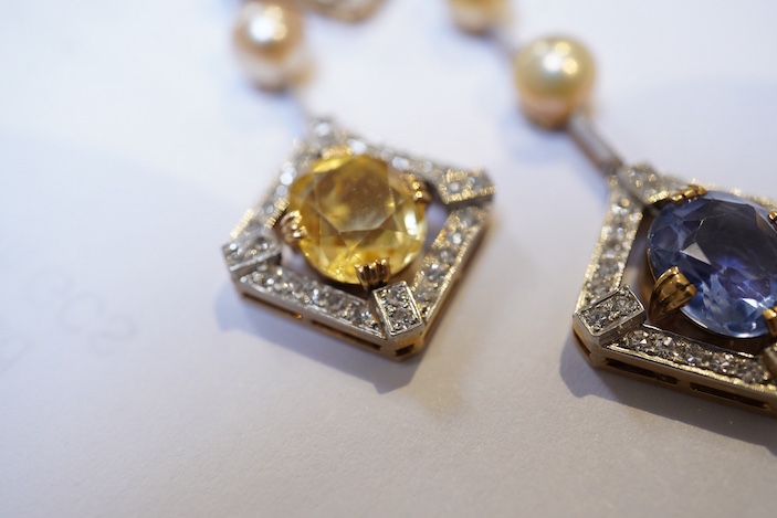 An Art Deco sapphire, natural pearl and diamond necklace, circa 1920